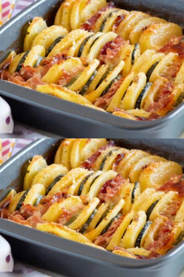 Gratin appetitoso di patate e zucchine con prosciutto